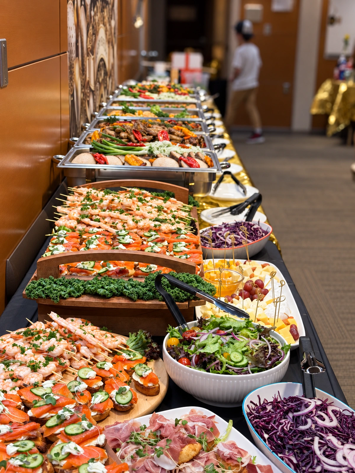 Sharing platters and hot dishes arranged along a buffet table