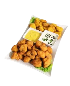 A Plate Of Chicken Nuggets.